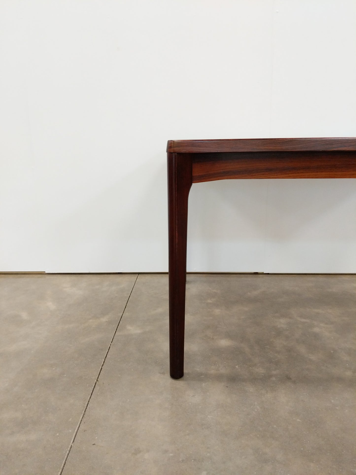 Vintage Danish Modern Rosewood Extendable Dining Table by Henning Kjaernulf